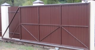 Купить откатные ворота из профнастила Крымск, цена от 1757 руб.