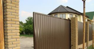 Купить откатные ворота из профнастила Крымск, цена от 1757 руб.